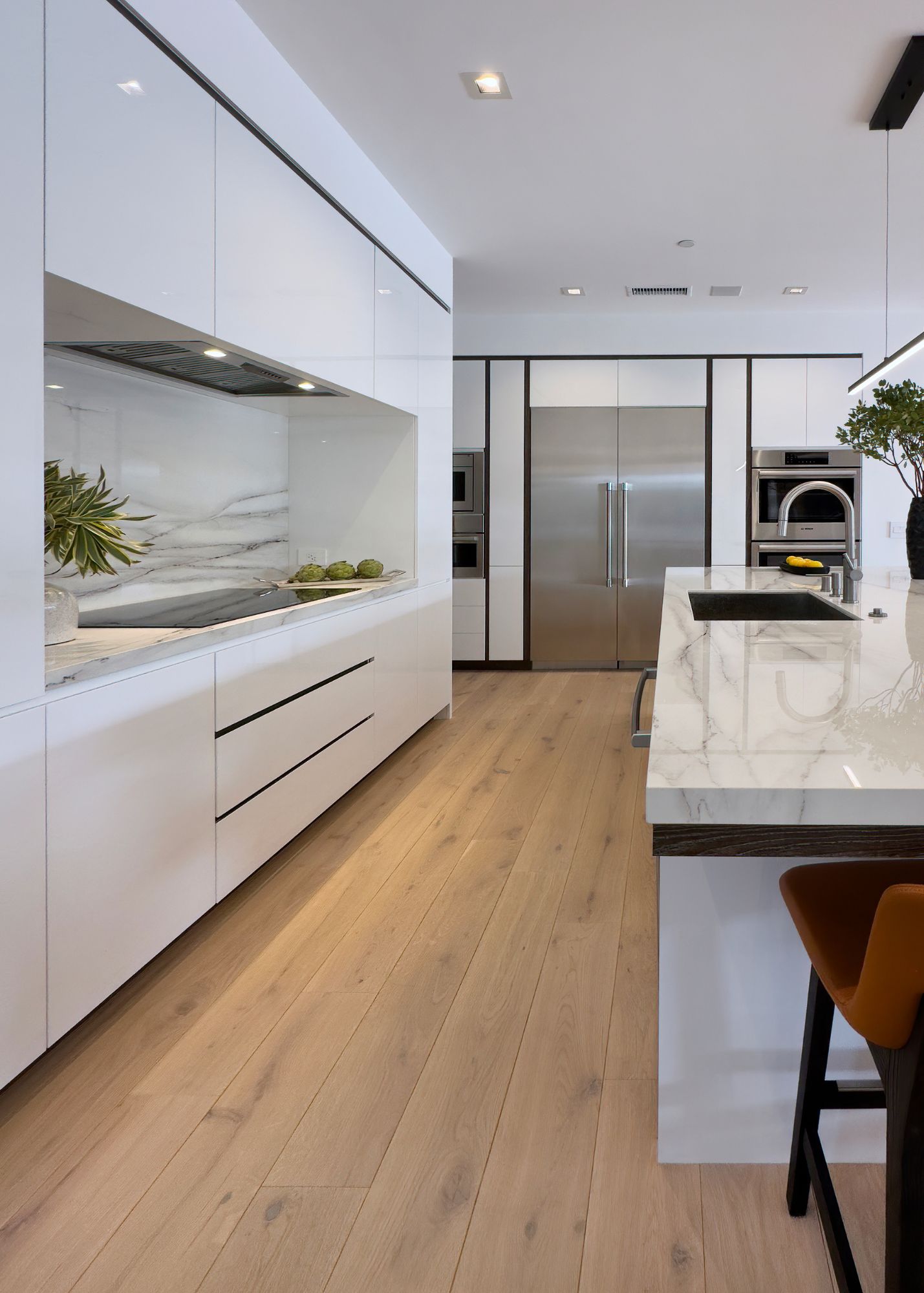 7 easy ways to keep your wood floor beautiful - light modern kitchen